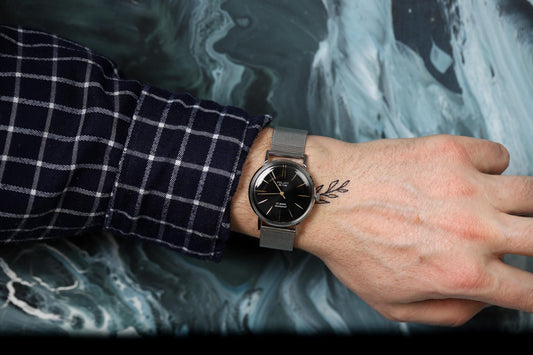 Rare vintage mens watch from the 1970s. A mechanical watch with a unique black dial