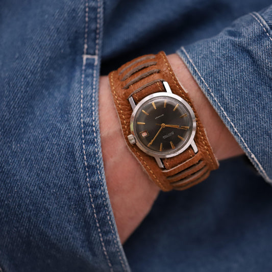 Rare vintage watch VOSTOK  1970s | Mechanical men's wristwatch with a leather strap.